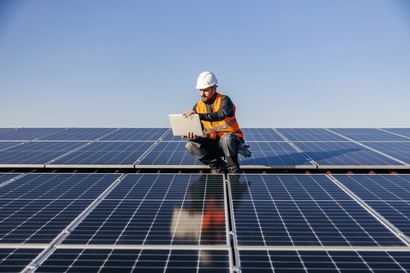 Professional installing solar panels